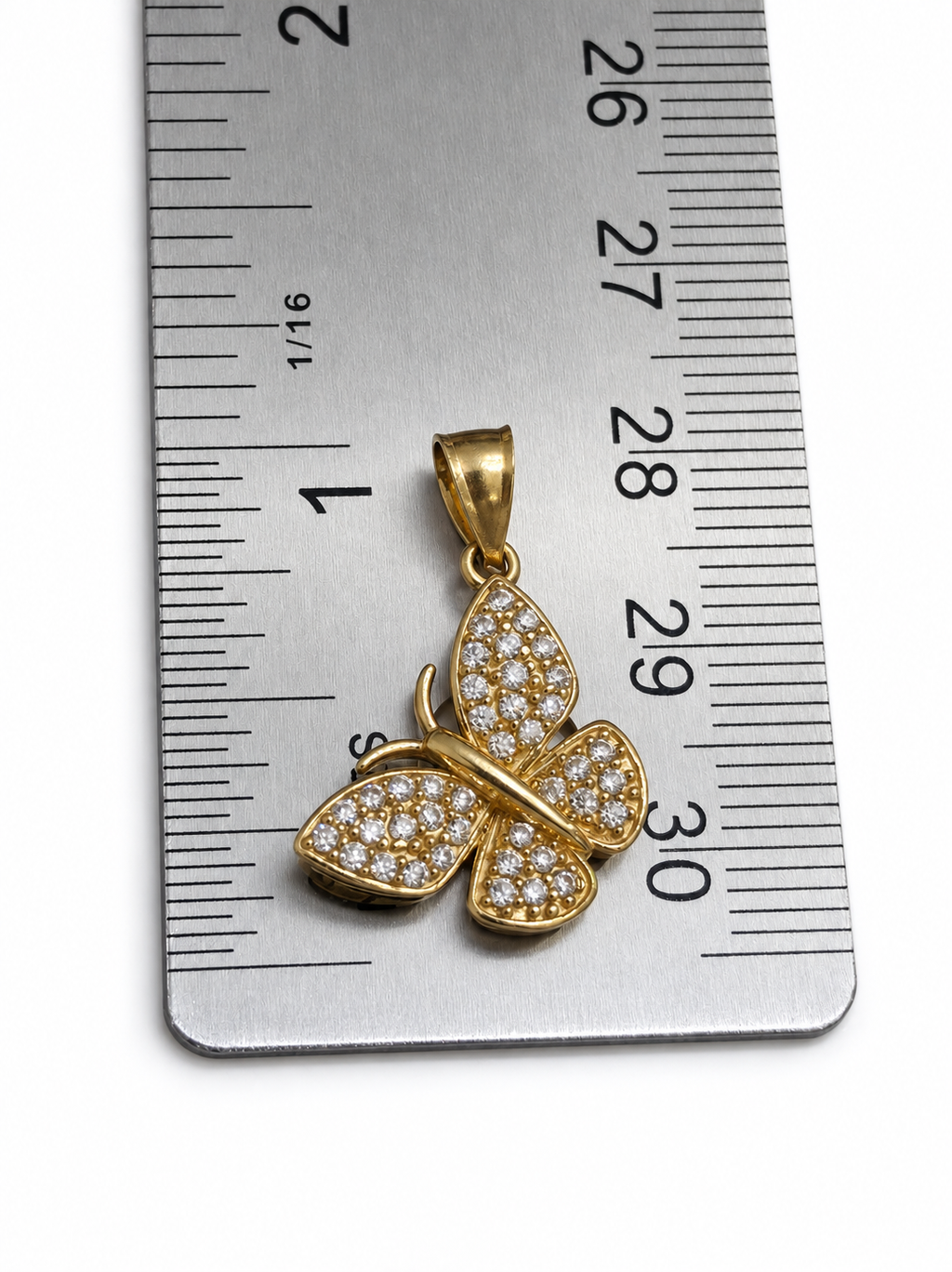 Mariposa con circonias en oro 10K