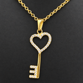 Cadena cable con llave de corazon y circonias en 10k